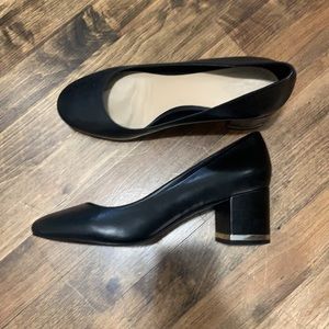 Black leather ALDO block heel pumps with silver accent on heel. Worn once. 8